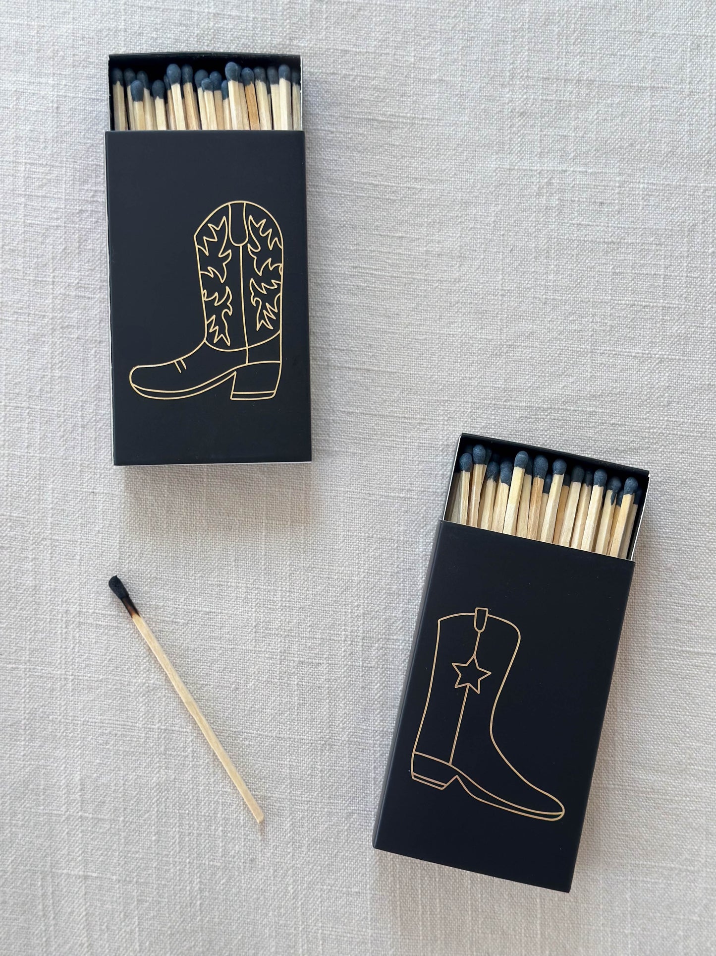 Black cowboy boot safety matches