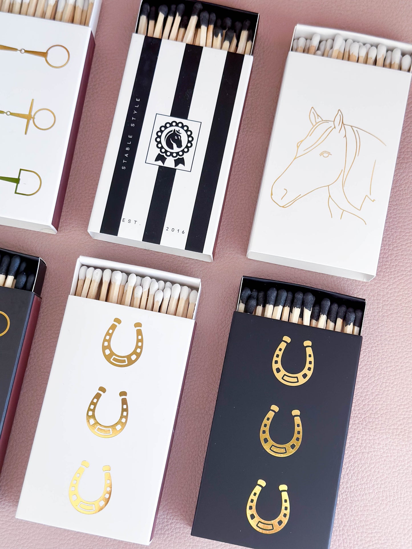 Equestrian match boxes with horseshoes and horses